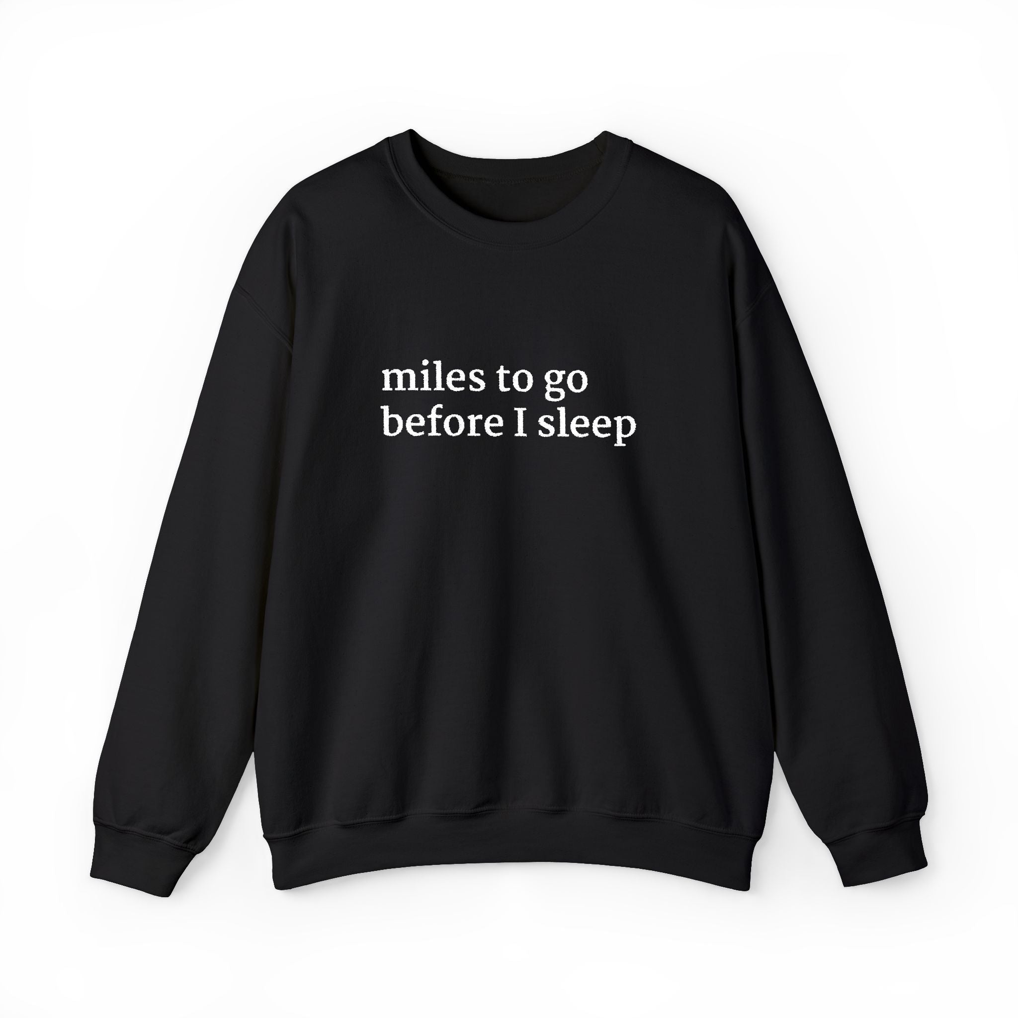 Black crewneck sweatshirt with white embroidered text on the chest reading “miles to go before I sleep,” displayed on a plain white background.
