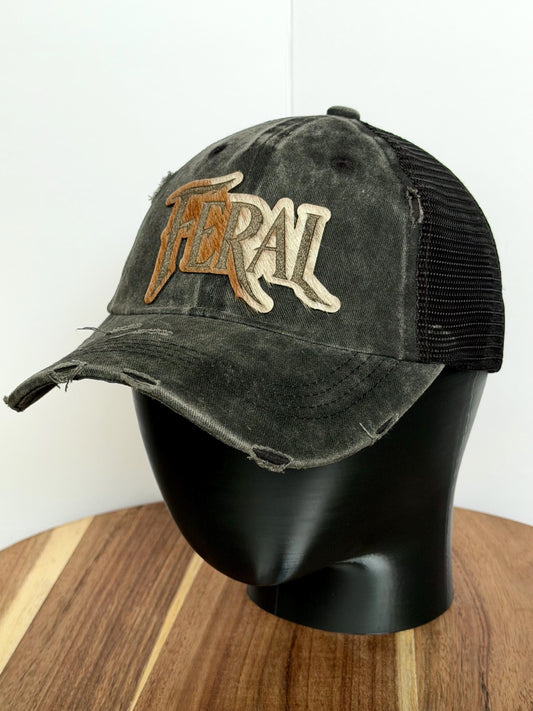 FERAL Trucker Hat – Hair-on-Hide Leather Patch | Distressed Black Ball Cap
